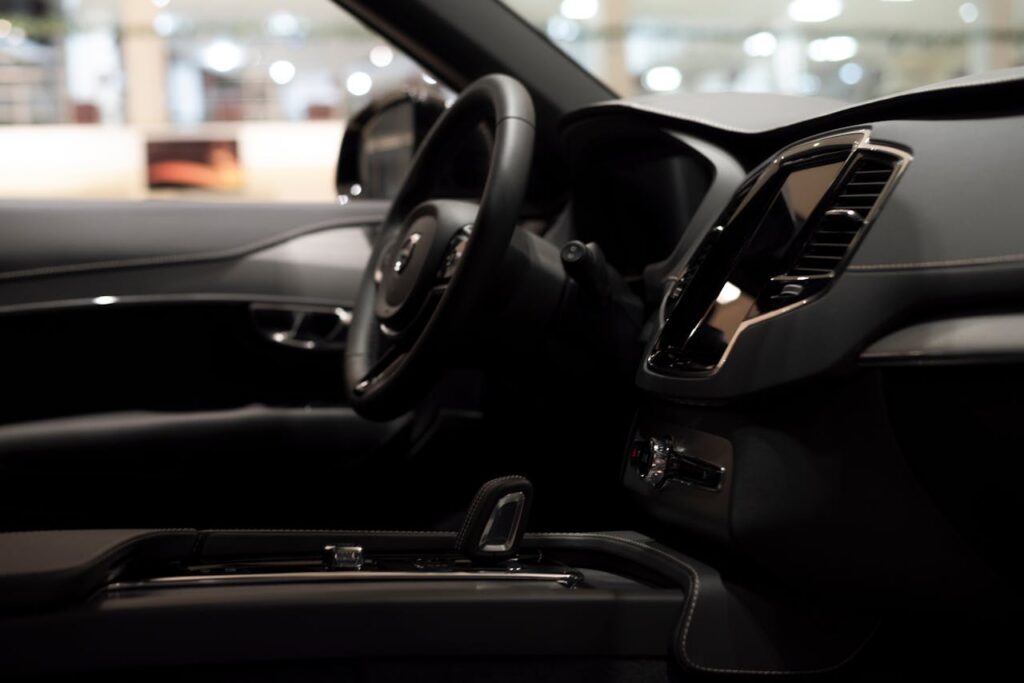 Luxury car interior showcasing sleek design and modern technology features.
